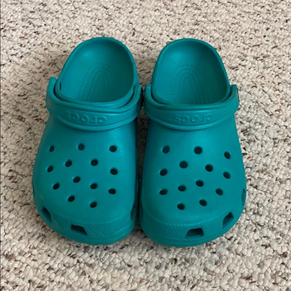 Aqua green crocs